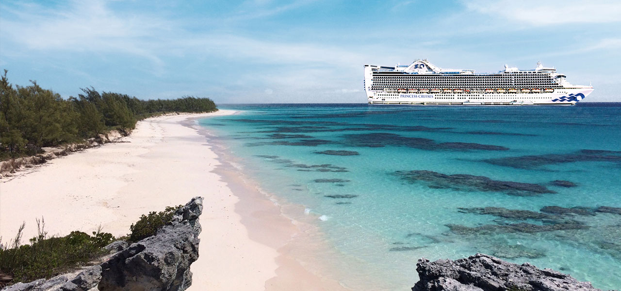 Image of beautiful Caribbean beach with Princess cruise ship in the distance