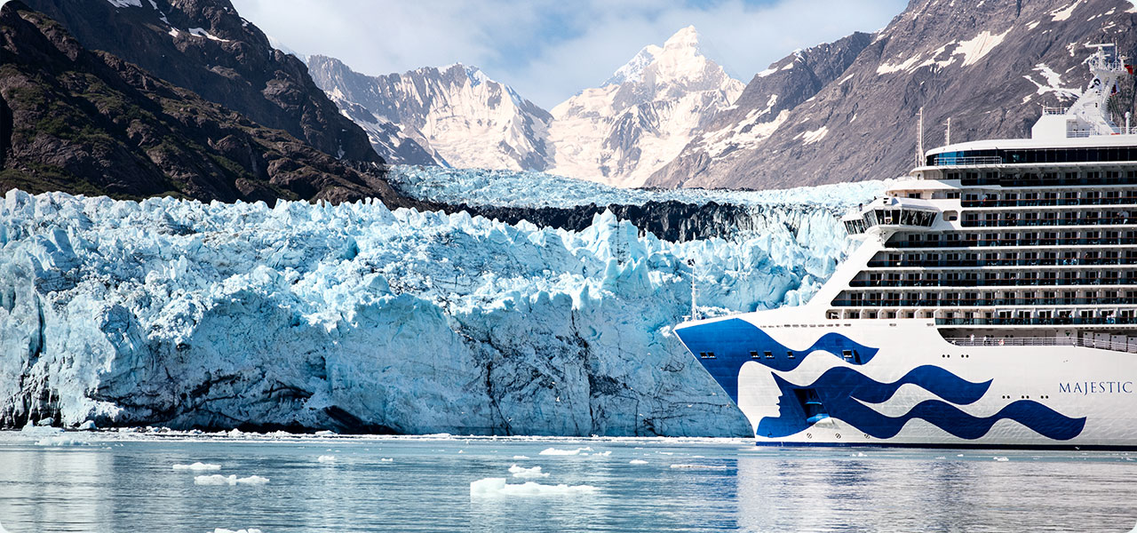Princess cruise navigating the waterways of Glacier Bay National Park right next to Alaska glaciers.