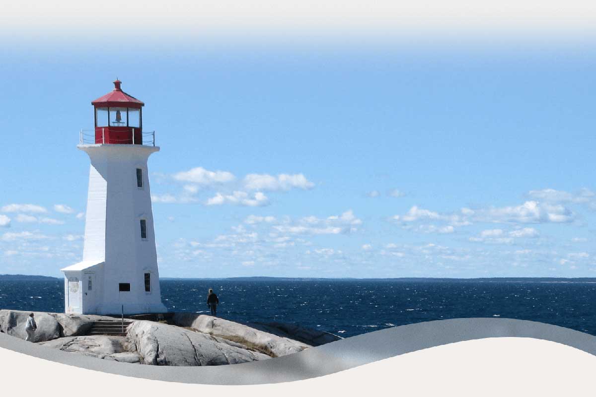 New England lighthouse with red cap.