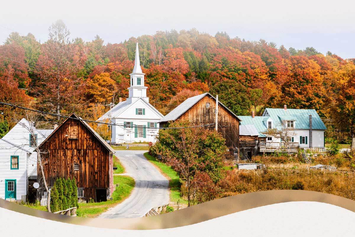 Small New England town with colorful autumn leaves.