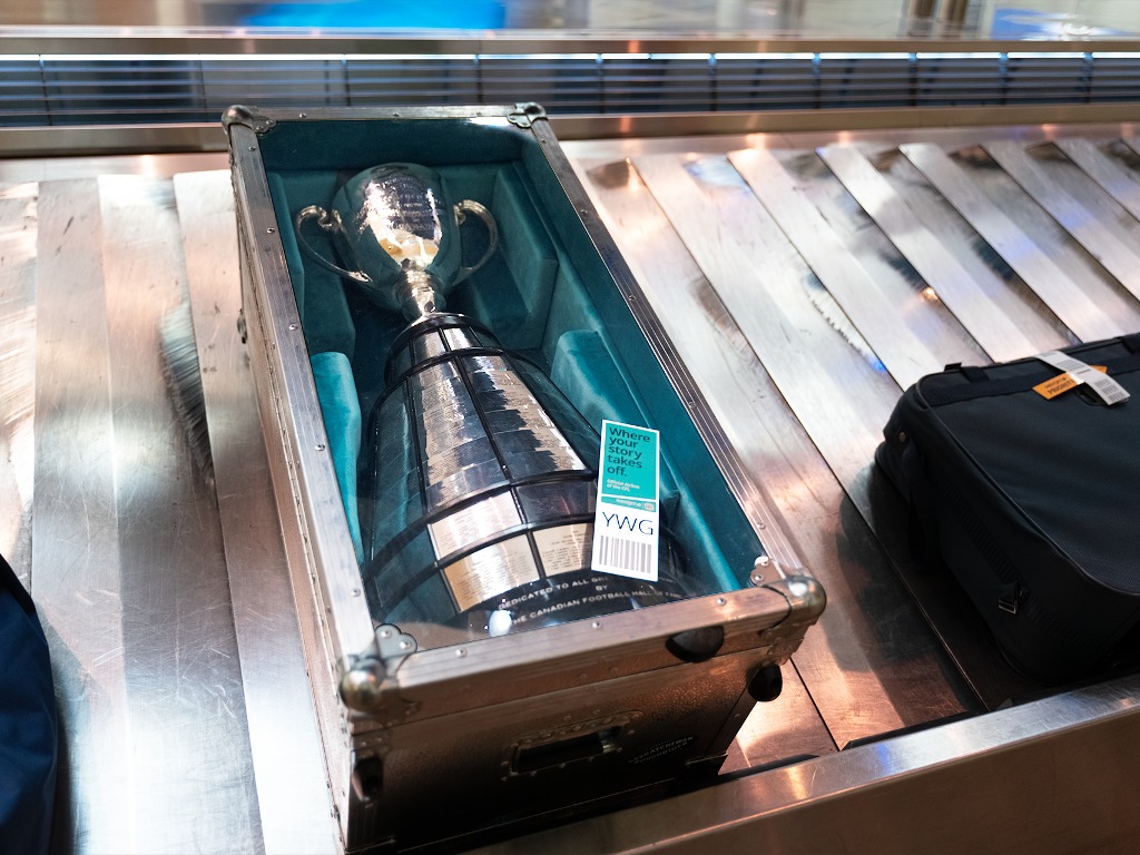 WestJet surprises YWG travellers with CFL Grey Cup trophy